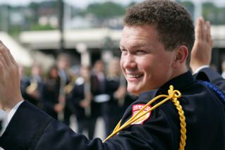 Eric James Harms conducting his high school band at St. Thomas Academy.