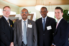 Executive Director Patrick Plonski, Rwandan Ambassador Girma Birru, Ethiopian Ambassador James Kimoyo, and Founder of the Knowledge Drive John Stacey III after officially signing the partnership between Books For Africa and Course Hero
