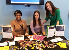 Amber Pointer (left), the book drive coordinator, and other volunteers at General Mills.