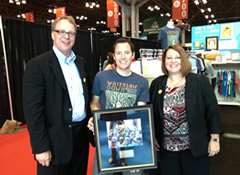 Pat Plonski and Tammie Follett - BFA Board Member, present the Kilimanjaro Society Award of Merit to Jeff LeBlanc Out of Print.