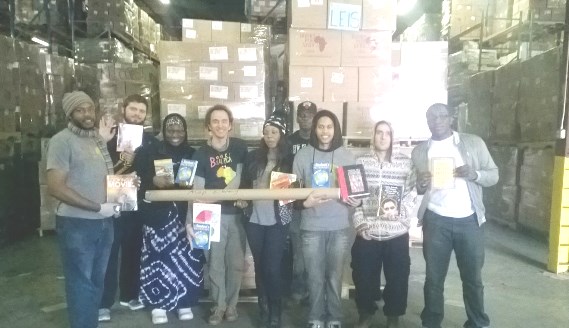 BFA staff and volunteers prepare materials for shipment to Liberia
