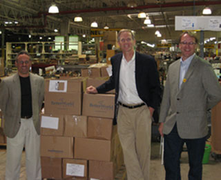 Pictured above on the Better World Books warehouse floor are Shaun Skelton, Executive Director of Visions In Action; David Murphy, President and CEO of Better World Books; and Pat Plonski, Executive Director of Books For Africa.