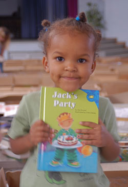 This little girl helped her mother choose books from the BFA shipment for Gabane Primary School in Botswana.