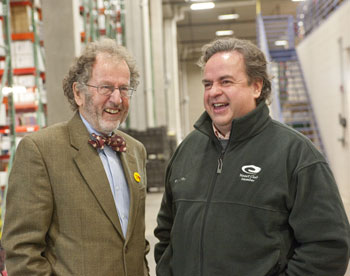 Tom Warth, Books For Africa founder, with Bob Coughlan, Capstone owner. 