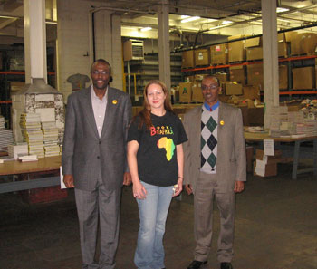 Touring the BFA Minnesota warehouse, from left: Tom Gitaa, BFA President-Elect; April Gilbert, BFA Minnesota Warehouse Manager; and Dr. Hussein A. Bulhan, President/Chancellor of the University of Hargeisa, Somaliland (Somalia).