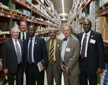 Touring the Lerner Publishing warehouse in Minneapolis, Minnesota. From left: Harry Lerner (Chairman of Lerner Publishing), Pat Plonski (BFA Executive Director), Ambassador Agyekum of Ghana, Asratie Teferra (BFA board member), Tom Warth (BFA founder), and Tom Gitaa (BFA board president).